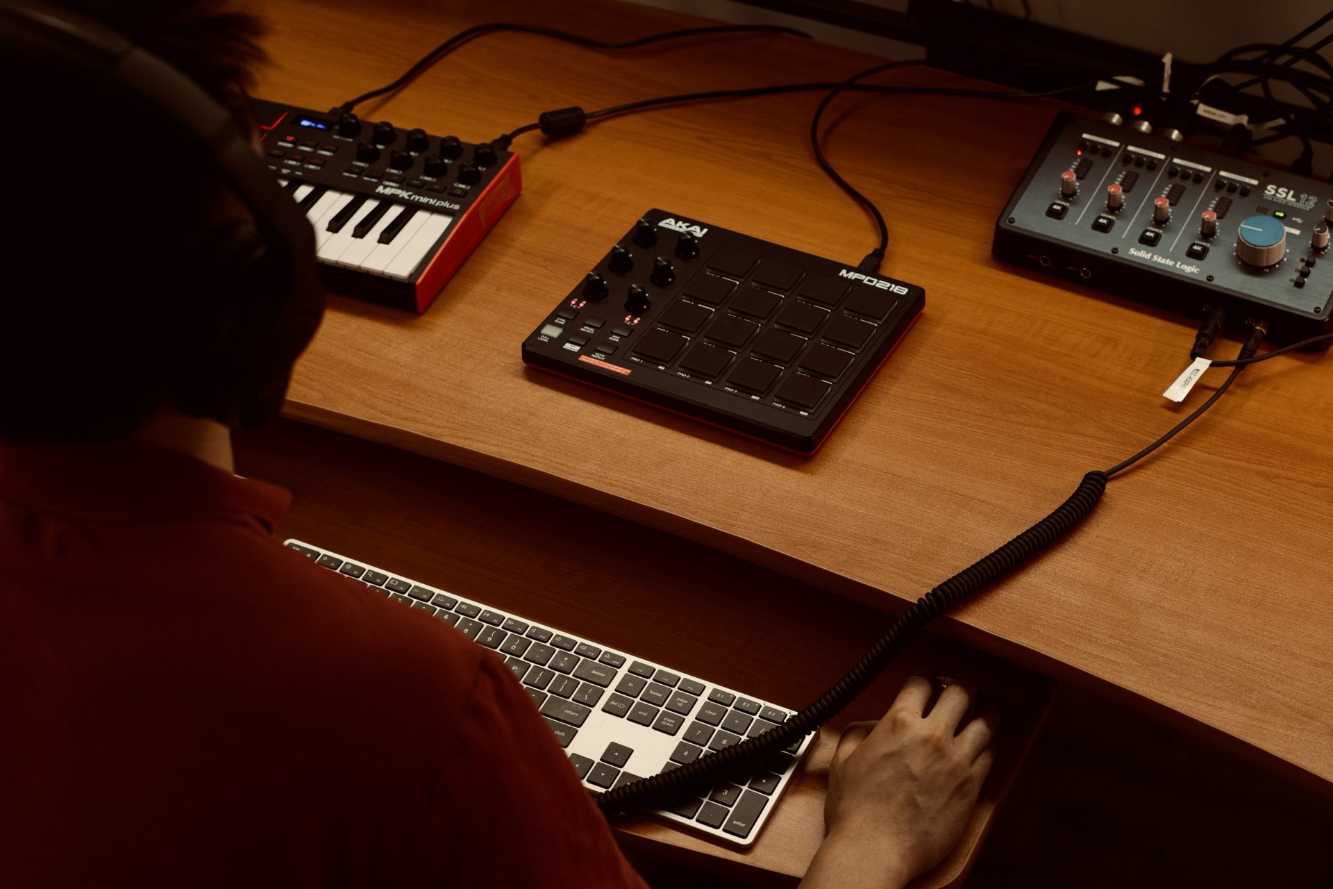 Beat-making setup with MIDI pads and a keyboard in the music production room